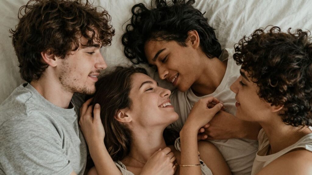 Three people in a comfortable, intimate, and connected setting.