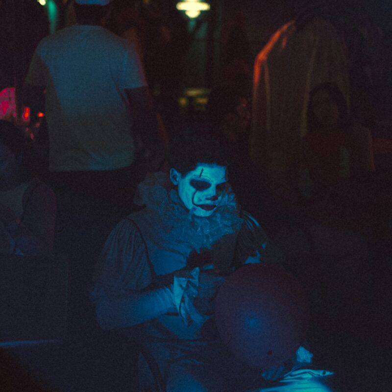 a group of people in a dark room