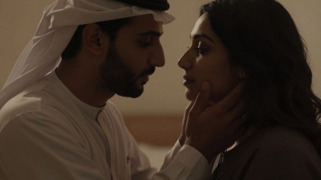 Couple in intimate setting, close-up, soft lighting.