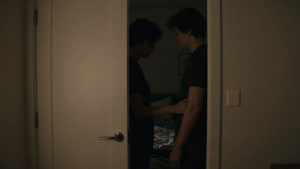 Couple in intimate setting near closet