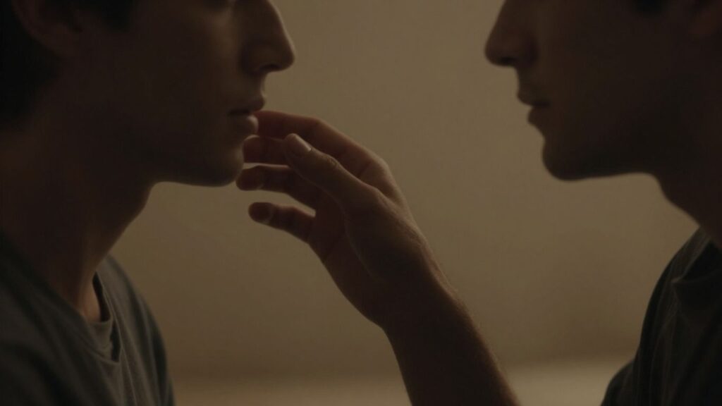 Two men sharing an intimate, tender moment.