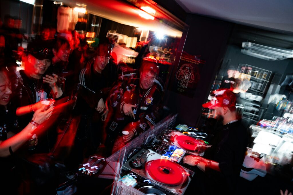 dj playing music for a crowd at a concert