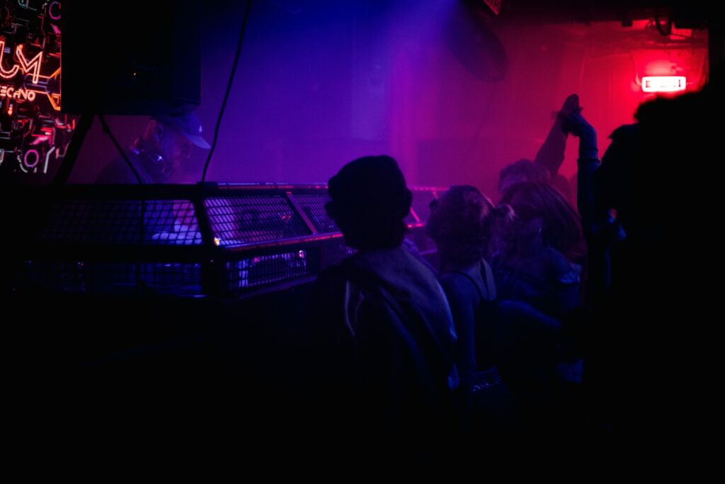 a group of people in a dark room